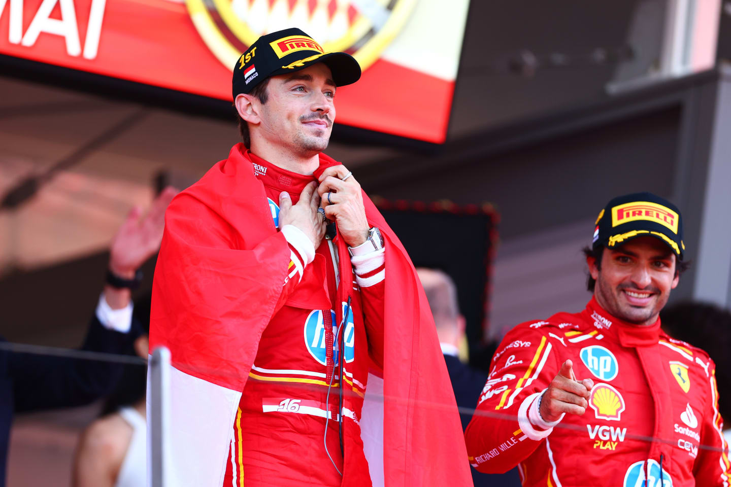 MONTE-CARLO, MONACO - MAY 26: Race winner Charles Leclerc of Monaco and Ferrari celebrates on the podium during the F1 Grand Prix of Monaco at Circuit de Monaco on May 26, 2024 in Monte-Carlo, Monaco. (Photo by Bryn Lennon - Formula 1/Formula 1 via Getty Images)