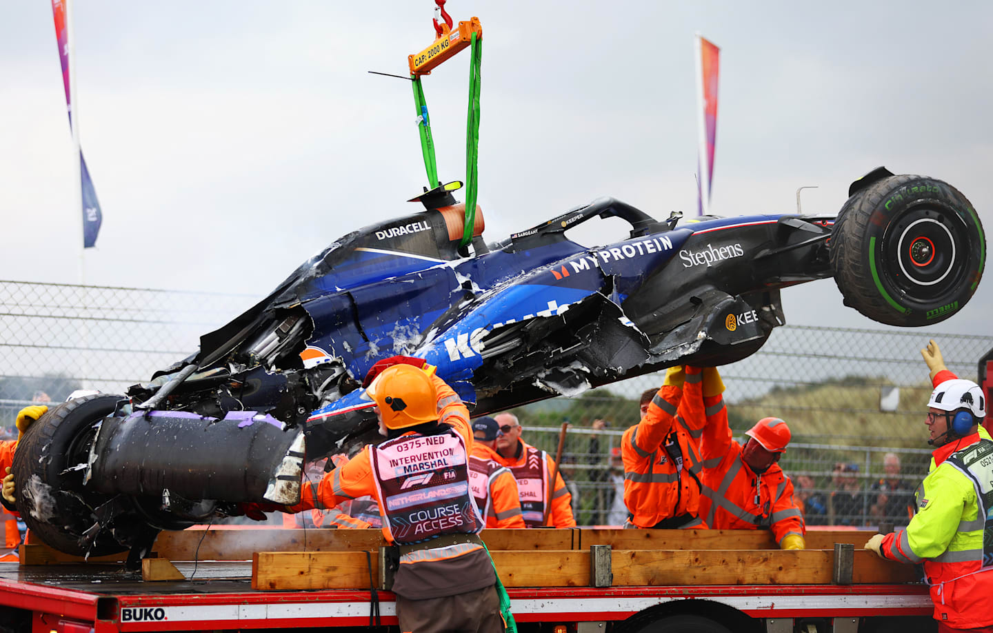 ZANDVOORT, NETHERLANDS - AUGUST 24: The car of Logan Sargeant of United States and Williams is recovered from the track after crashing during final practice. (Photo by Bryn Lennon - Formula 1/Formula 1 via Getty Images)