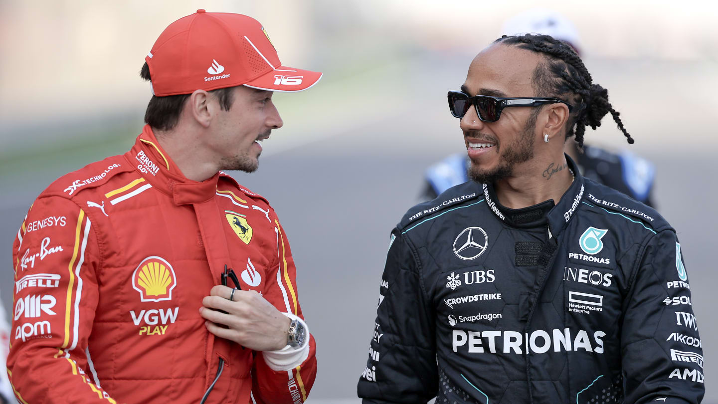 BAHRAIN, BAHRAIN - MARCH 2: (L-R) Charles Leclerc of Monaco and Scuderia Ferrari talks to Lewis