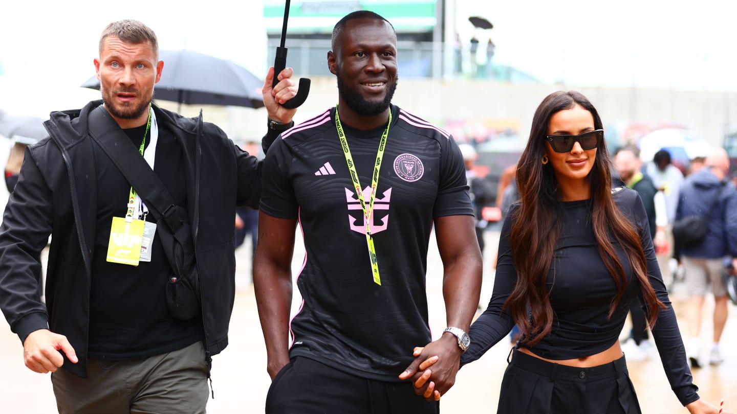 Rapper Stormzy and TV presenter Maya Jama were all smiles in the paddock