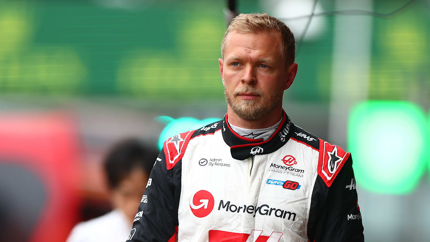 SPA, BELGIUM - JULY 27: 17th placed Kevin Magnussen of Denmark and Haas F1 walks in the Pitlane