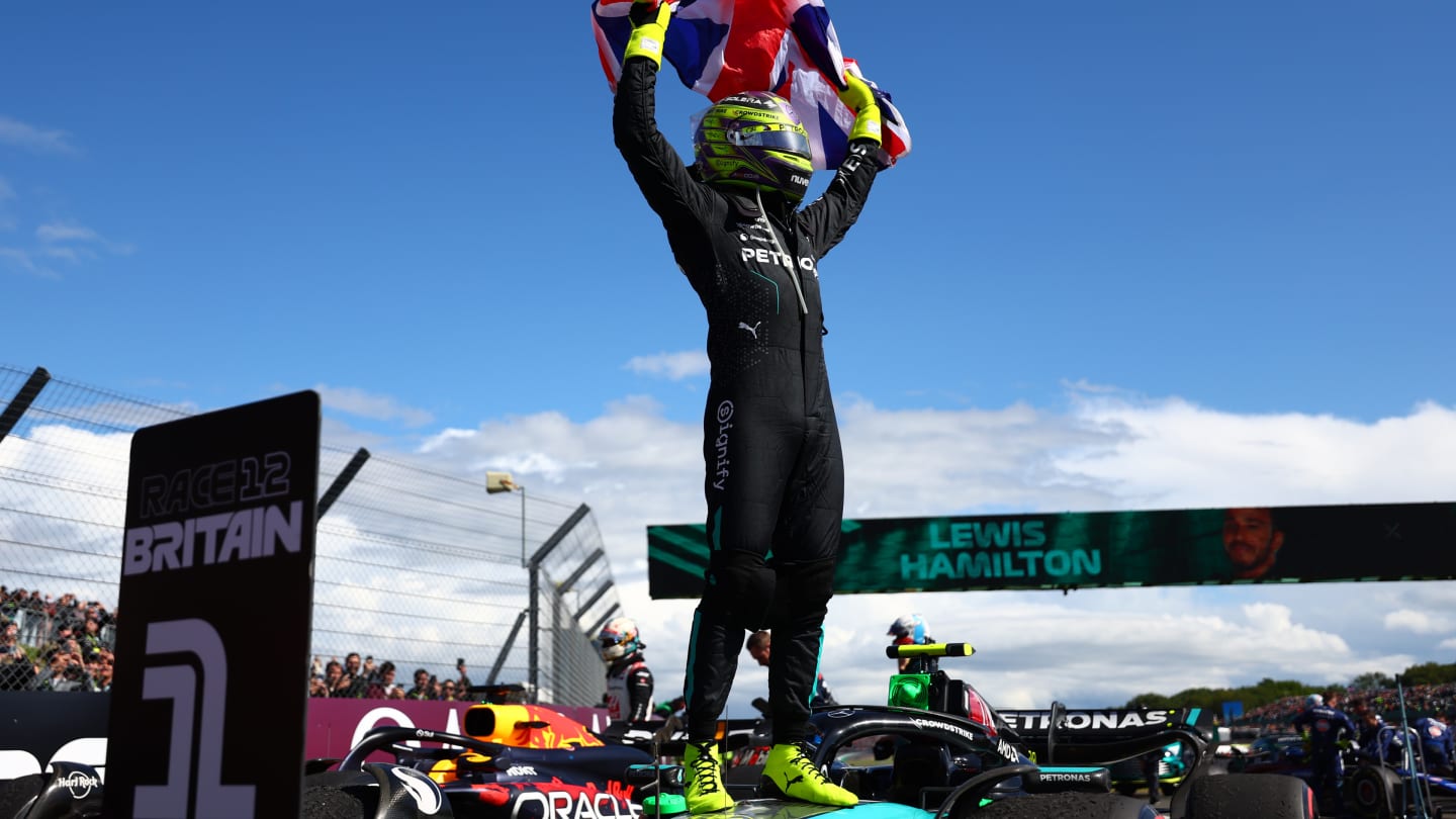 NORTHAMPTON, ENGLAND - JULY 07: Race winner Lewis Hamilton of Great Britain and Mercedes celebrates