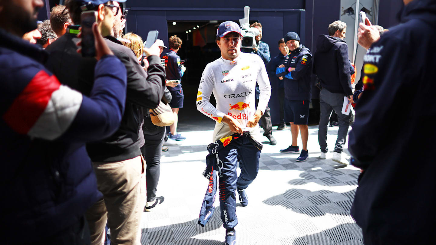 NORTHAMPTON, ENGLAND - JULY 06: Sergio Perez of Mexico and Oracle Red Bull Racing walks to the