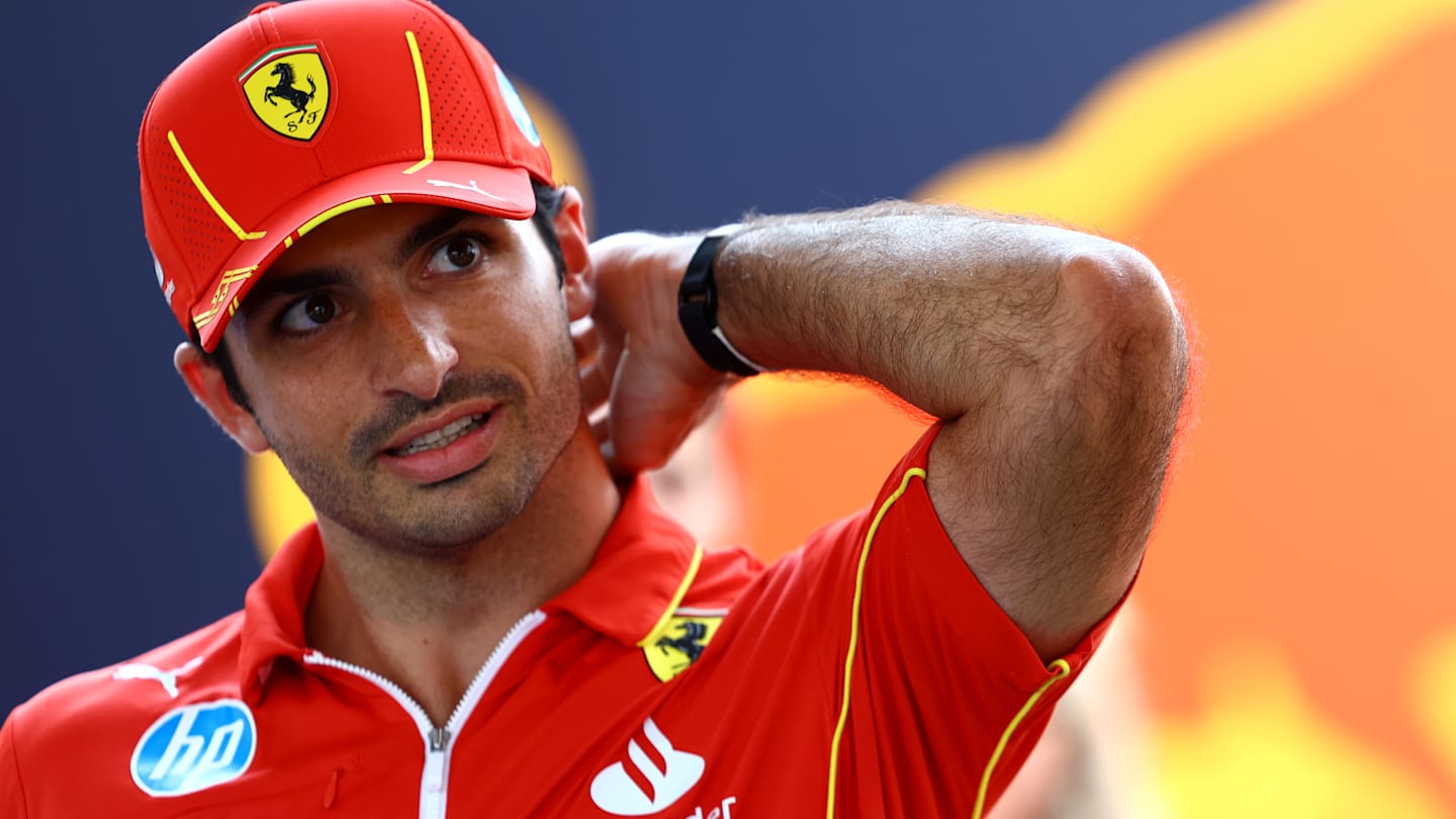 BUDAPEST, HUNGARY - JULY 18: Carlos Sainz of Spain and Ferrari looks on in the Paddock during