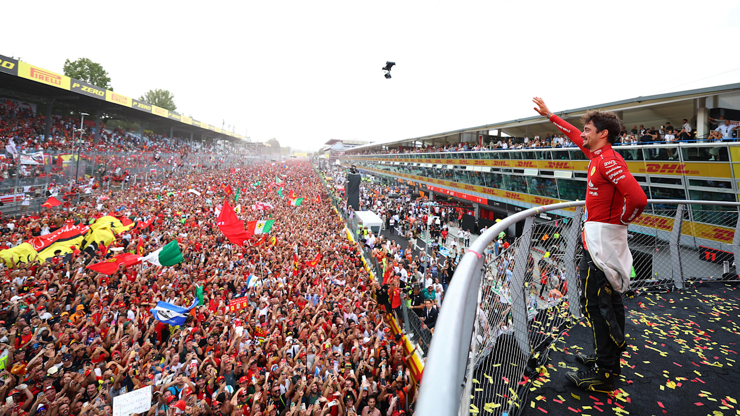 MONZA, ITALY - SEPTEMBER 01: Race winner Charles Leclerc of Monaco and Ferrari waves to fans from