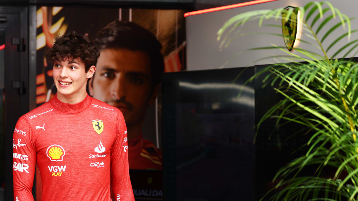 JEDDAH, SAUDI ARABIA - MARCH 08: Oliver Bearman of Great Britain and Ferrari walks in the Paddock.