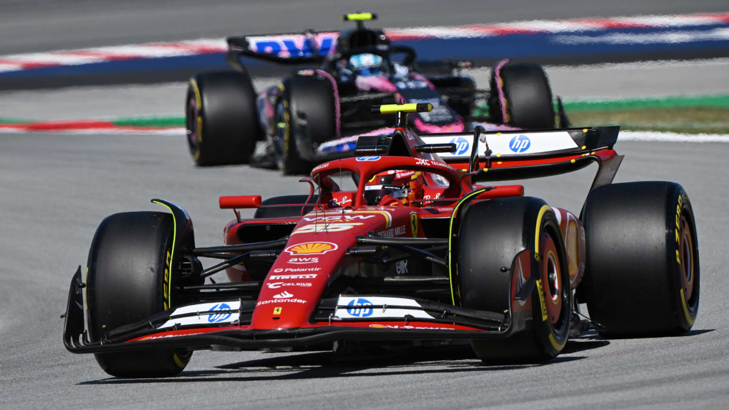 BARCELONA, SPAIN - JUNE 21: Carlos Sainz of Spain driving (55) the Ferrari SF-24 leads Pierre Gasly