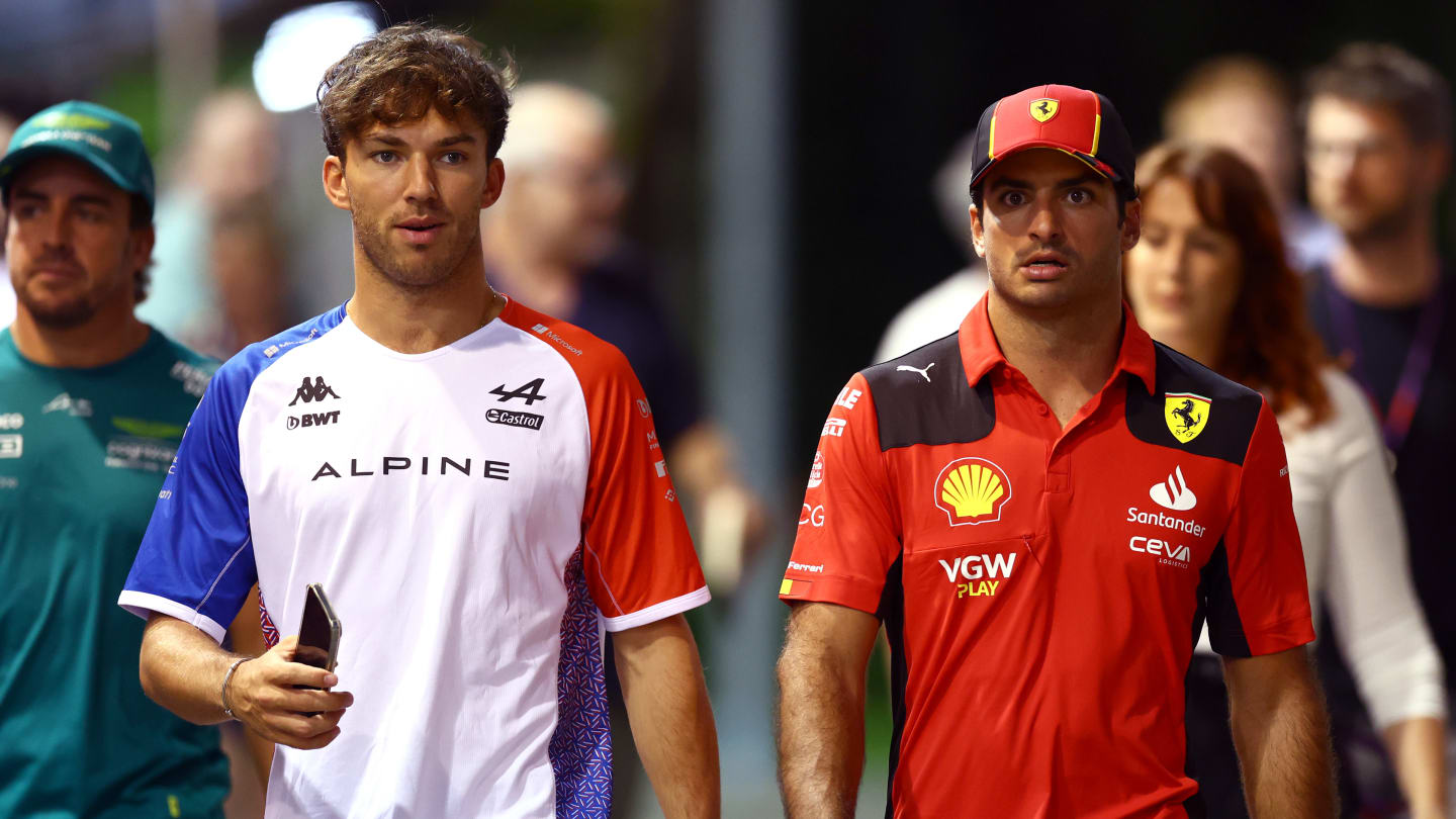 SINGAPORE, SINGAPORE - SEPTEMBER 14: Pierre Gasly of France and Alpine F1 and Carlos Sainz of Spain