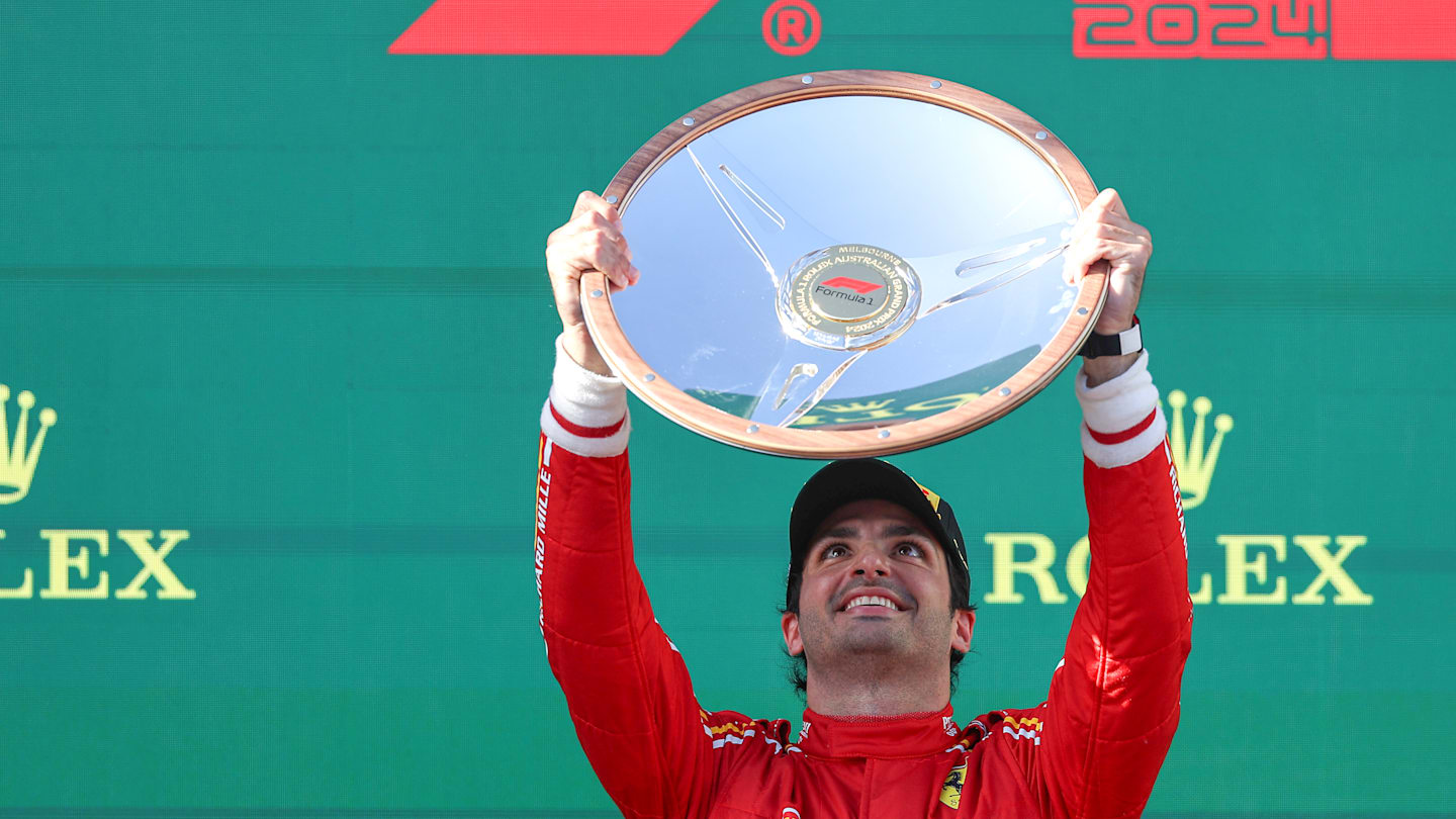 MELBOURNE, AUSTRALIA - MARCH 24: Carlos Sainz Jr of Spain and Scuderia Ferrari celebrates his win