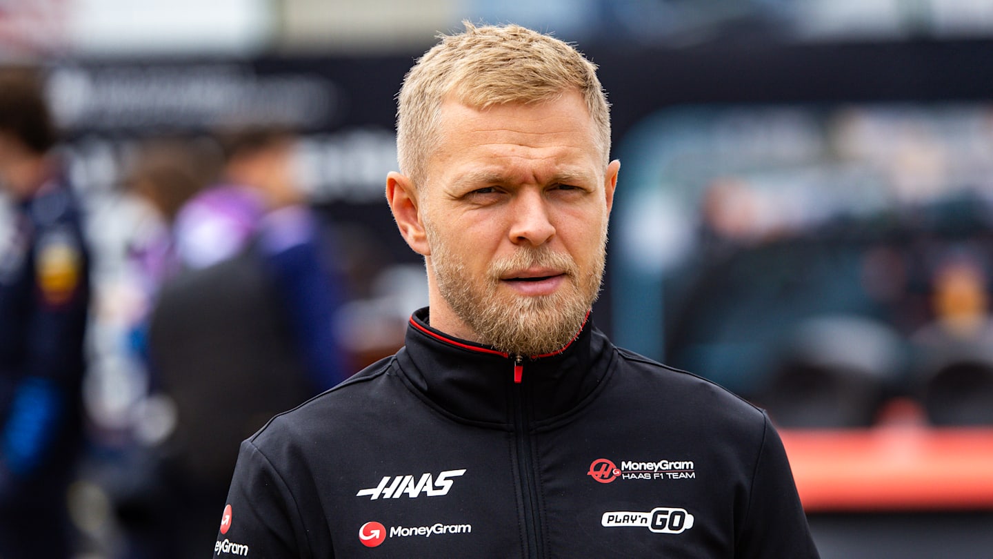 NORTHAMPTON, ENGLAND - JULY 7: Kevin Magnussen of Denmark and Haas F1 team looks on in the paddock