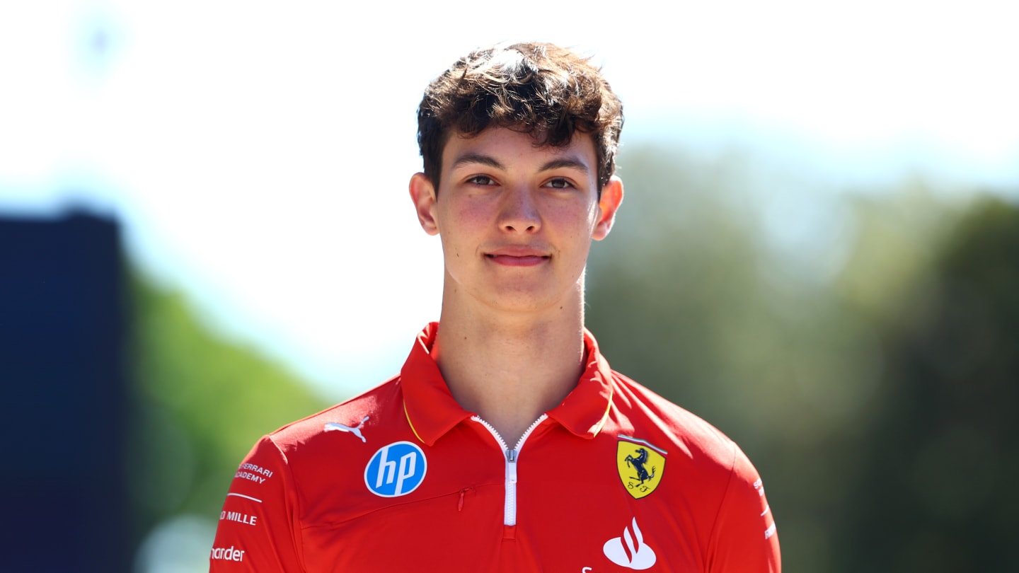 IMOLA, ITALY - MAY 18: Oliver Bearman of Great Britain and Ferrari walks in the F1 paddock prior to