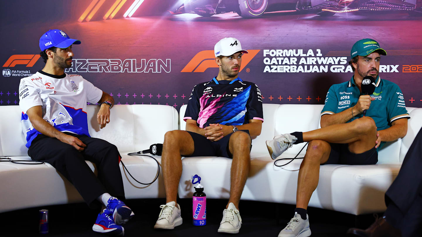 BAKU, AZERBAIJAN - SEPTEMBER 12: Daniel Ricciardo of Australia and Visa Cash App RB, Pierre Gasly