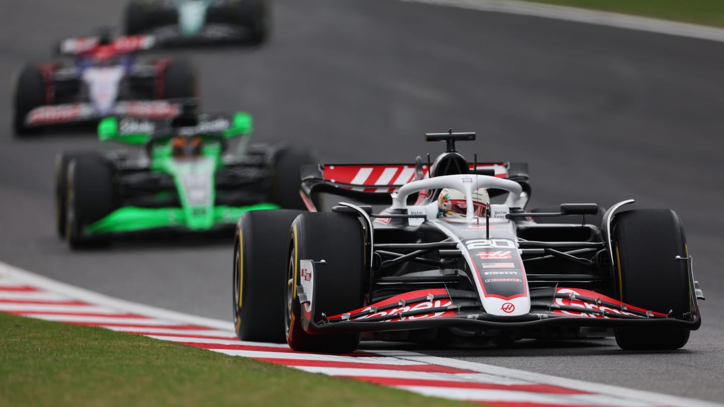 SHANGHAI, CHINA - APRIL 20: Kevin Magnussen of Denmark driving the (20) Haas F1 VF-24 Ferrari leads