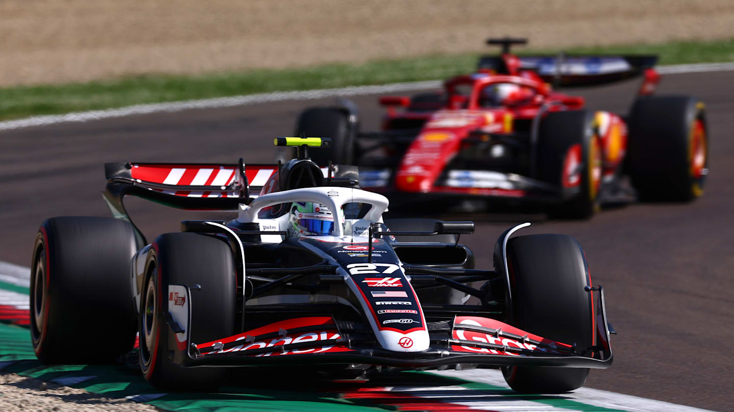 IMOLA, ITALY - MAY 18: Nico Hulkenberg of Germany driving the (27) Haas F1 VF-24 Ferrari leads