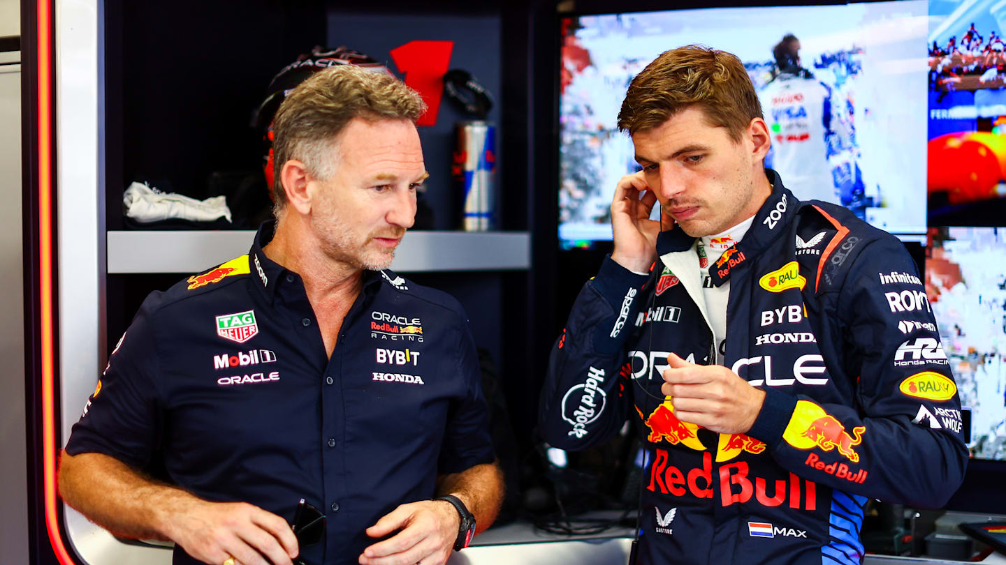 BUDAPEST, HUNGARY - JULY 19: Oracle Red Bull Racing Team Principal Christian Horner talks to Max