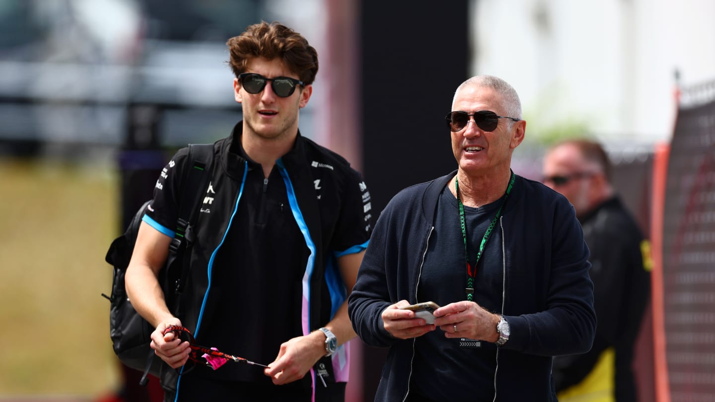 SUZUKA, JAPAN - APRIL 04: Jack Doohan of Australia and Alpine F1 and Mick Doohan walk in the