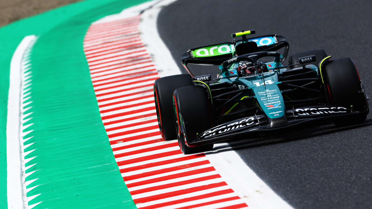 SUZUKA, JAPAN - APRIL 06: Fernando Alonso of Spain driving the (14) Aston Martin AMR24 Mercedes on