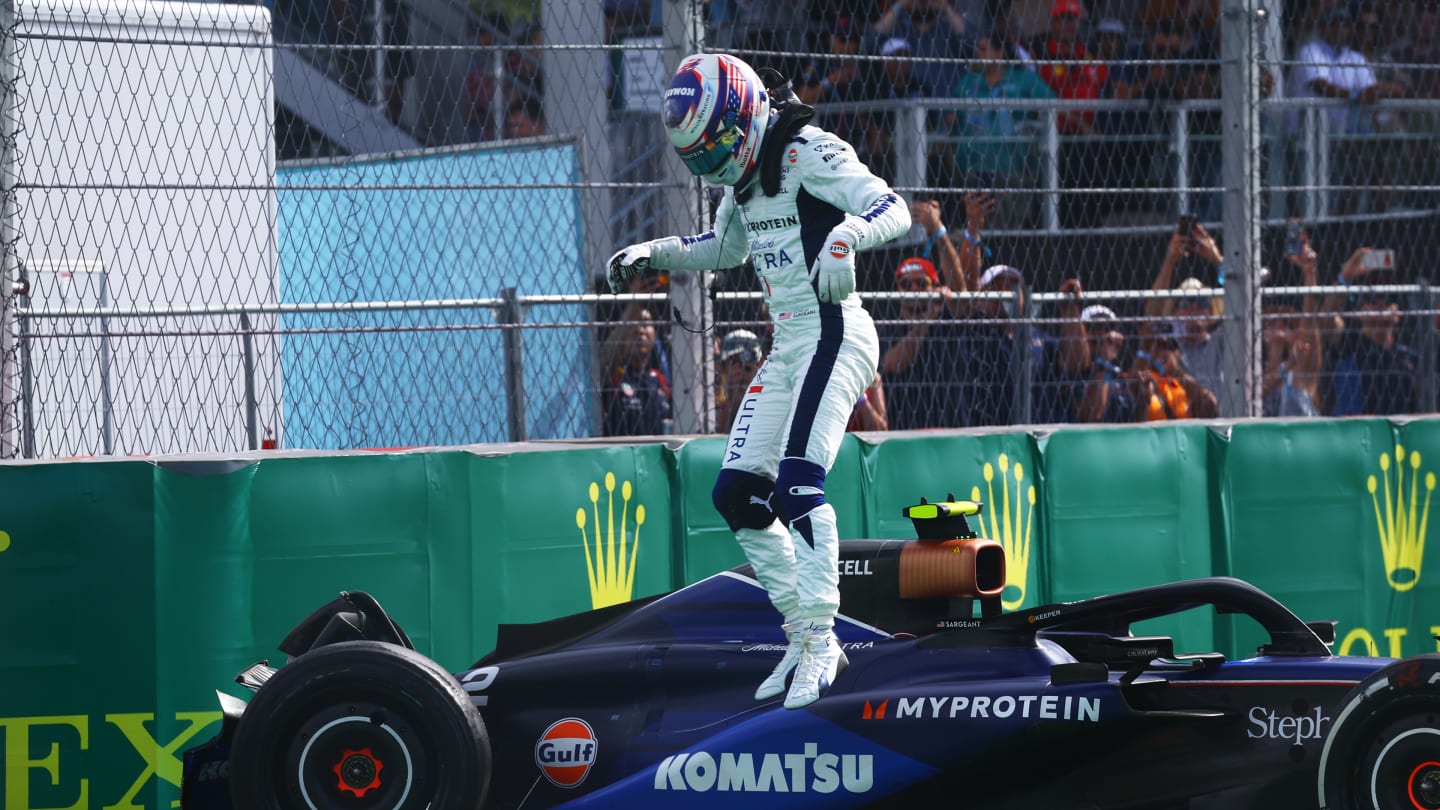 MIAMI, FLORIDA - MAY 05: Logan Sargeant of United States and Williams jumps from his car after