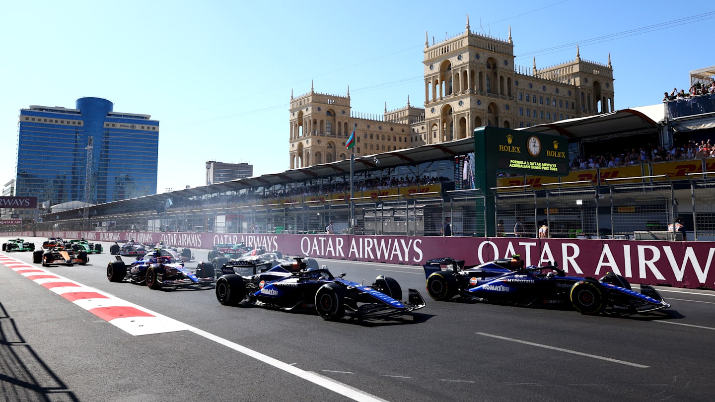 BAKU, AZERBAIJAN - SEPTEMBER 15: Franco Colapinto of Argentina driving the (43) Williams FW46 Mercedes leads Alexander Albon of Thailand driving the (23) Williams FW46 Mercedes at the start during the F1 Grand Prix of Azerbaijan at Baku City Circuit on September 15, 2024 in Baku, Azerbaijan. (Photo by Clive Rose - Formula 1/Formula 1 via Getty Images)