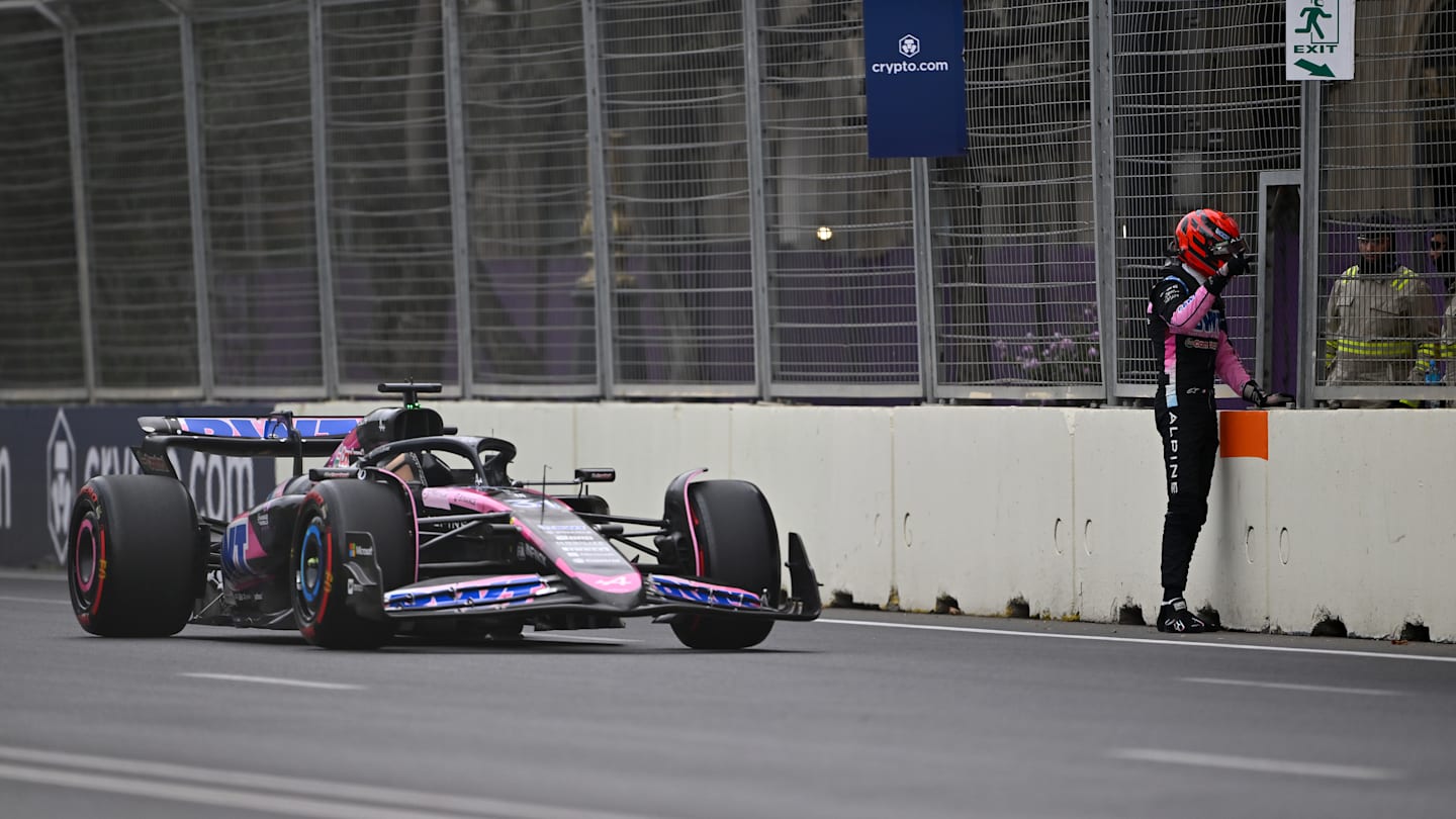 BAKU, AZERBAIJAN - SEPTEMBER 14: Esteban Ocon of France and Alpine F1 talks with track marshals