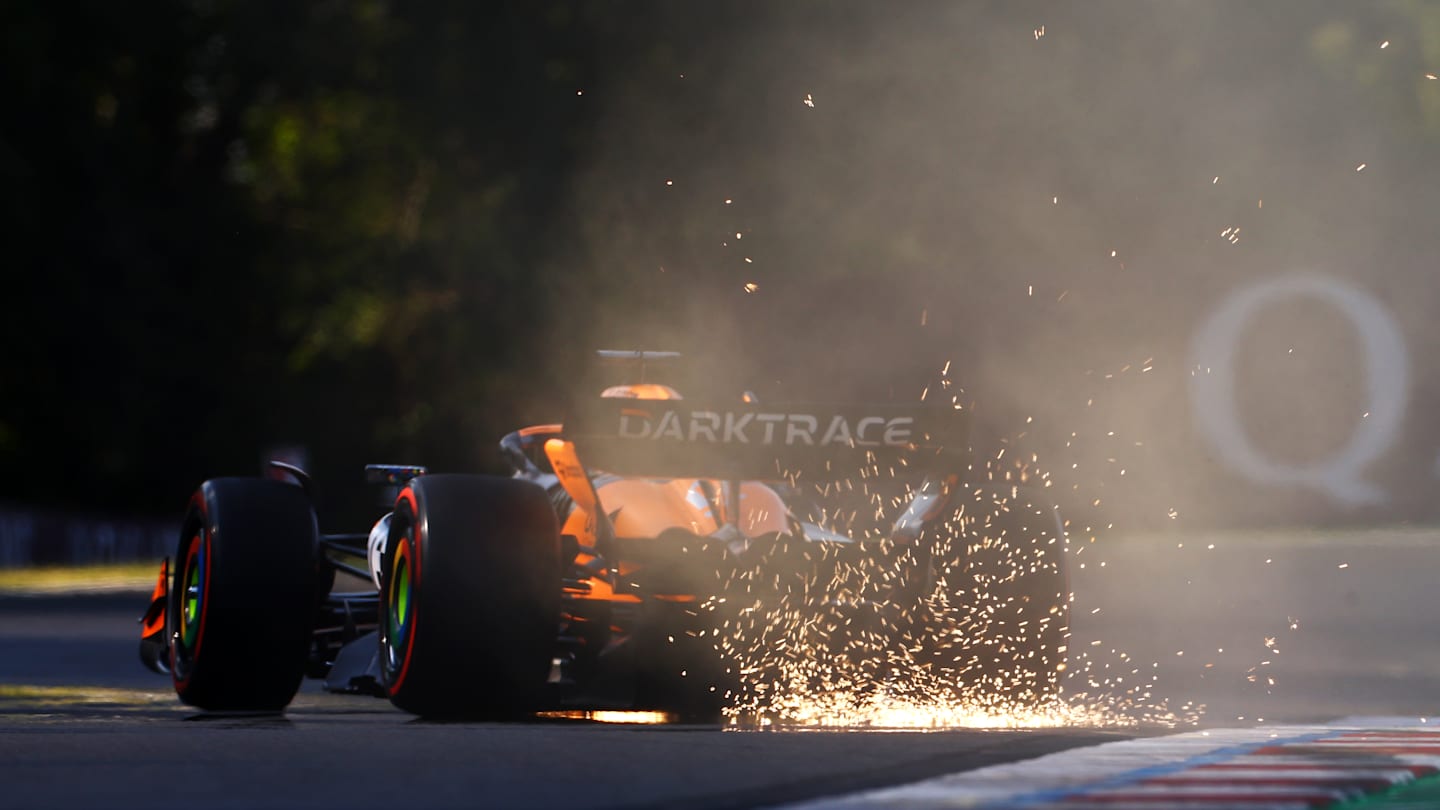 BUDAPEST, HUNGARY - JULY 19: Sparks fly behind Oscar Piastri of Australia driving the (81) McLaren