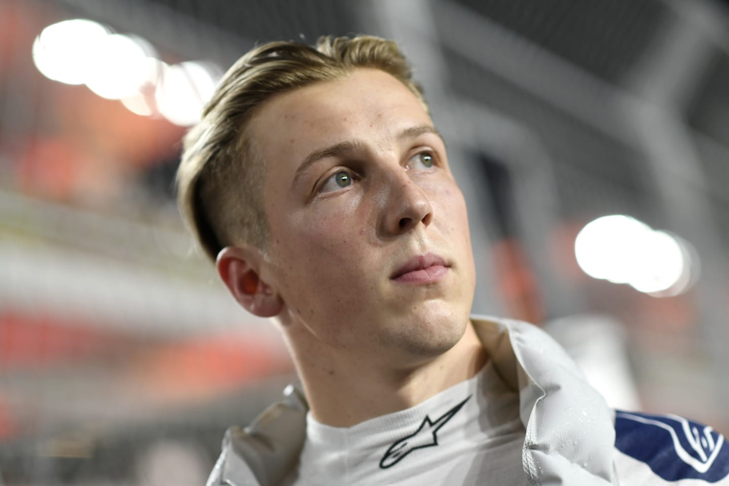 LUSAIL CITY, QATAR - OCTOBER 07: Liam Lawson of New Zealand and Scuderia AlphaTauri looks on from