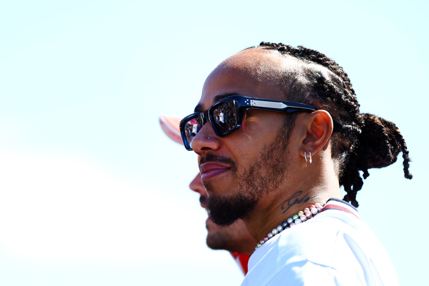 MELBOURNE, AUSTRALIA - MARCH 24: Lewis Hamilton of Great Britain and Mercedes looks on from the