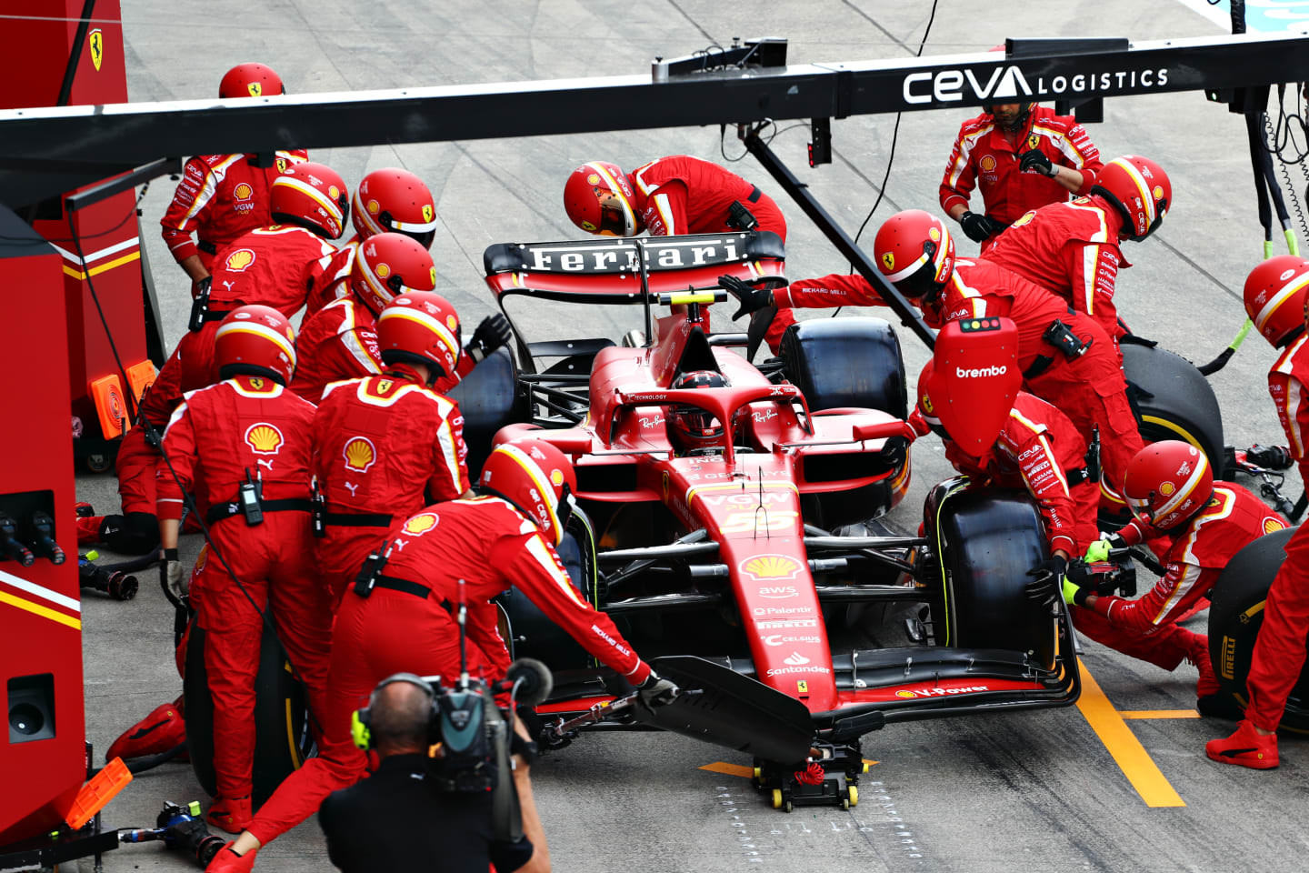 SUZUKA, JAPAN - APRIL 07: Carlos Sainz of Spain driving (55) the Ferrari SF-24 makes a pitstop