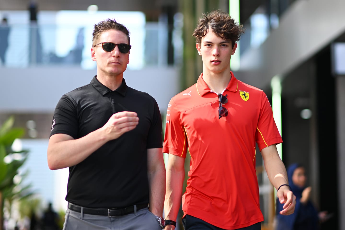 JEDDAH, SAUDI ARABIA - MARCH 07: Oliver Bearman of Great Britain and Ferrari walks in the Paddock,