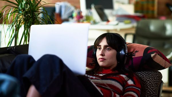 woman watching computer