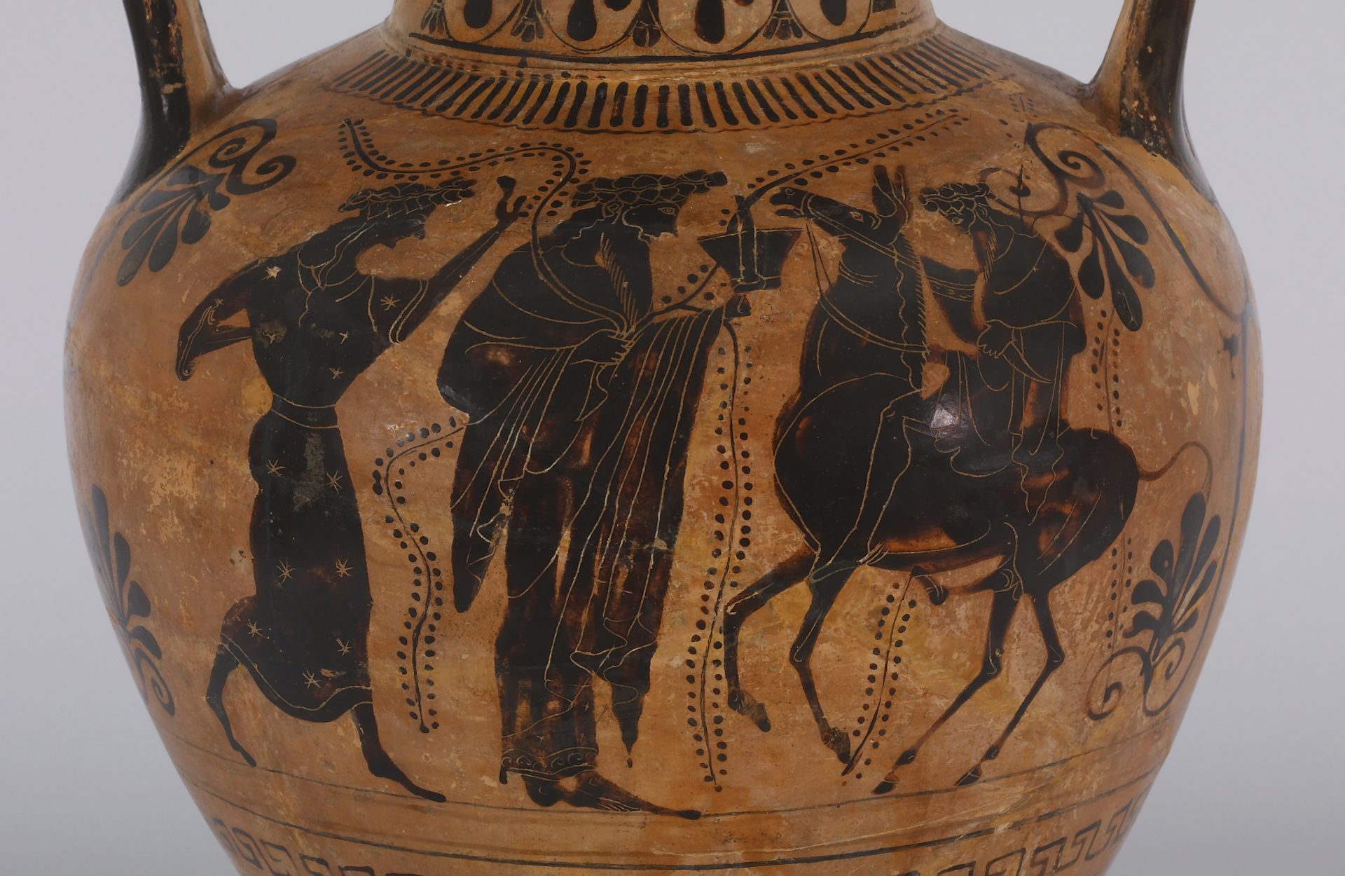 Vase painting of Dionysus and Hephaestus with a maenad