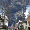 Ohio crews conduct a 'controlled release' of toxic chemicals from derailed train cars