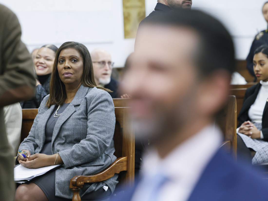 New York Attorney General Letitia James looks at Donald Trump, Jr., right, at the fraud trial for his father, former President Donald Trump on Nov. 2, 2023, in New York City.