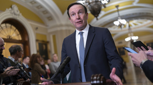 Sen. Chris Murphy, D-Conn., the Democrats' chief negotiator on the border security talks, speaks to reporters at the Capitol in December.