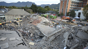 5 workers dead, dozens still missing after a building collapsed in South Africa