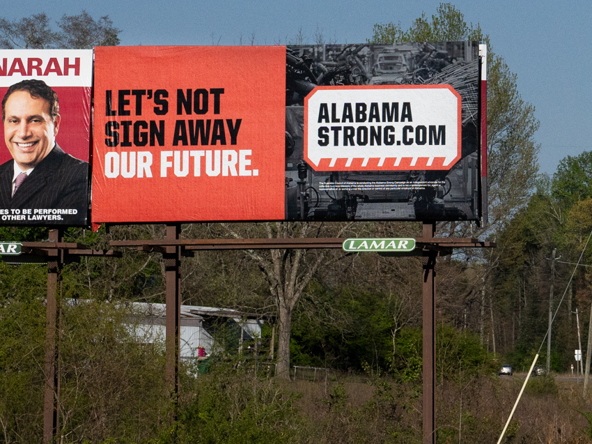 An anti-union billboard near the union hall that's served as headquarters for the organizing campaign at Mercedes-Benz.