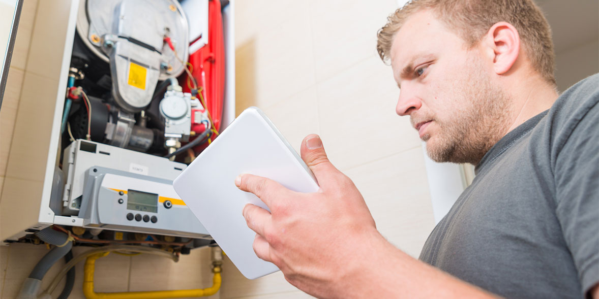 Engineer looking at a boiler