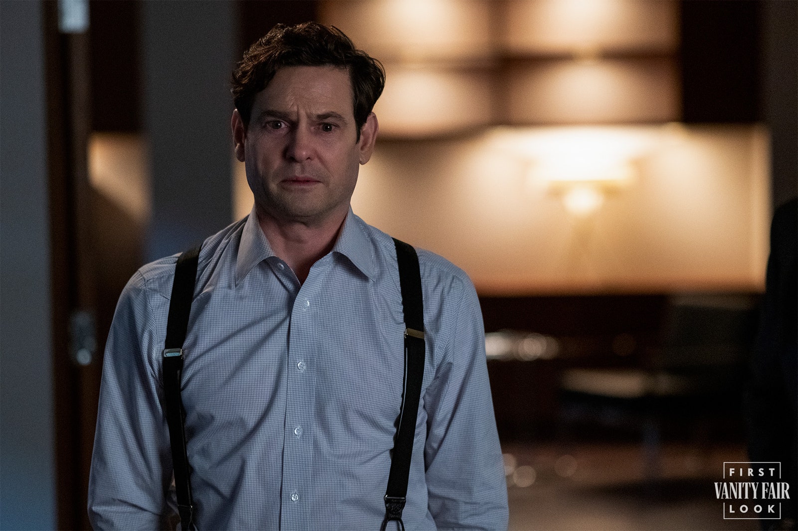 Image may contain Human Person Clothing Shirt Apparel Suspenders Colin Firth and Sleeve