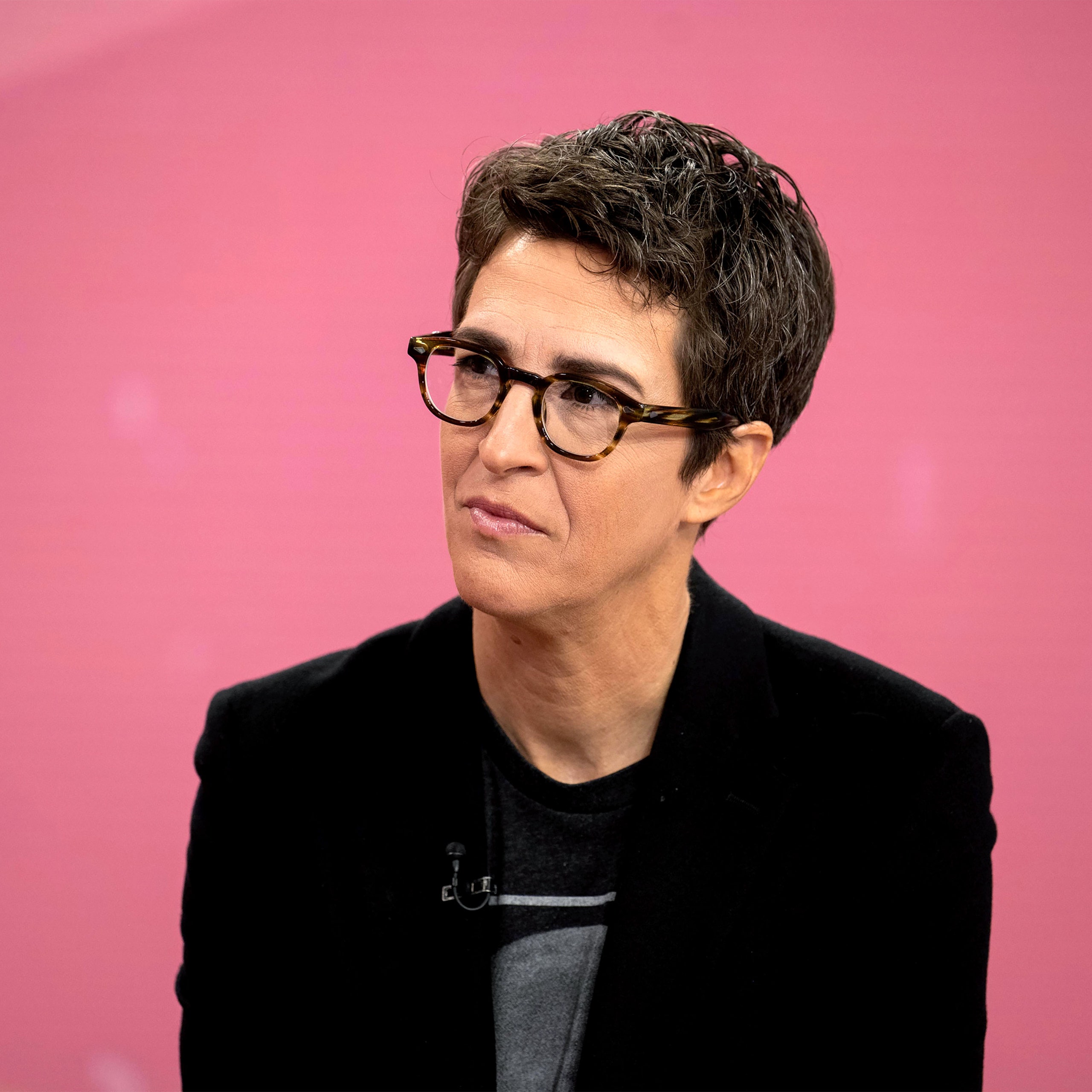 Image may contain Rachel Maddow Face Head Person Photography Portrait Adult Accessories Glasses and Blazer