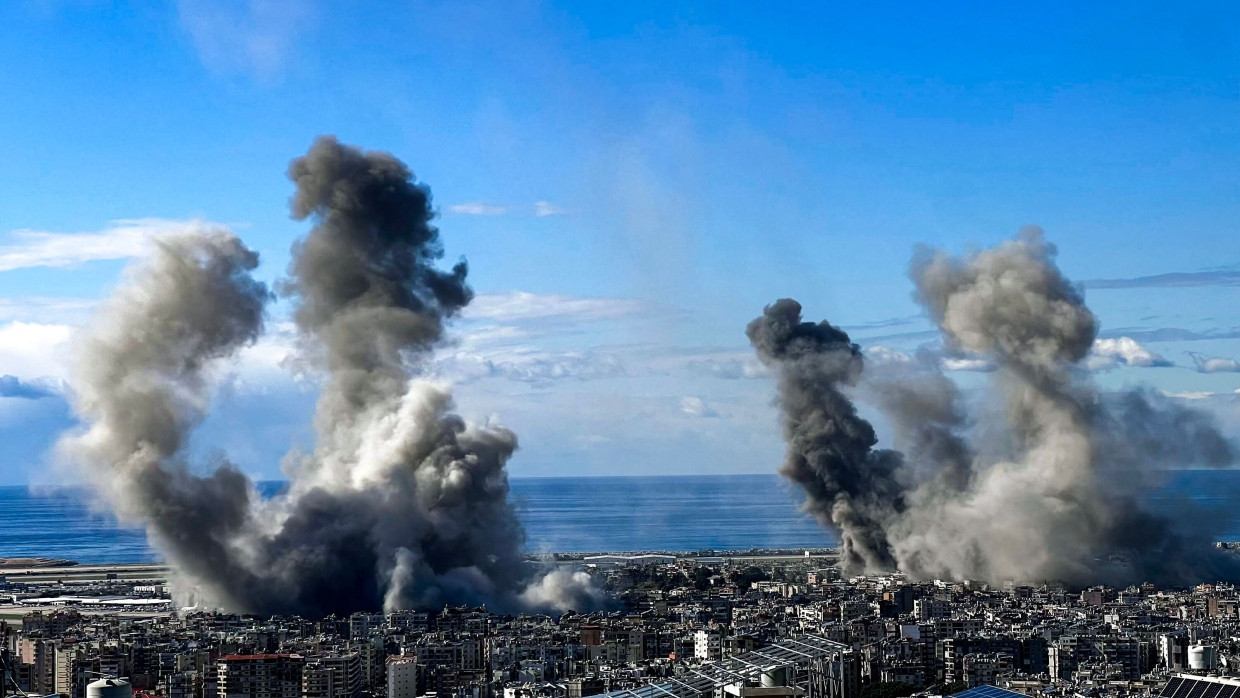 Smoke rises from the site of an Israeli airstrike that targeted Beirut’s southern suburbs on November 26, 2024, amid the ongoing war between Israel and Hezbollah. Israel's security cabinet was due to meet on November 26 to vote on a proposed ceasefire in its war with Hezbollah in Lebanon, an official said, while the White House voiced optimism that a deal was close. (Photo by Ibrahim AMRO / AFP)