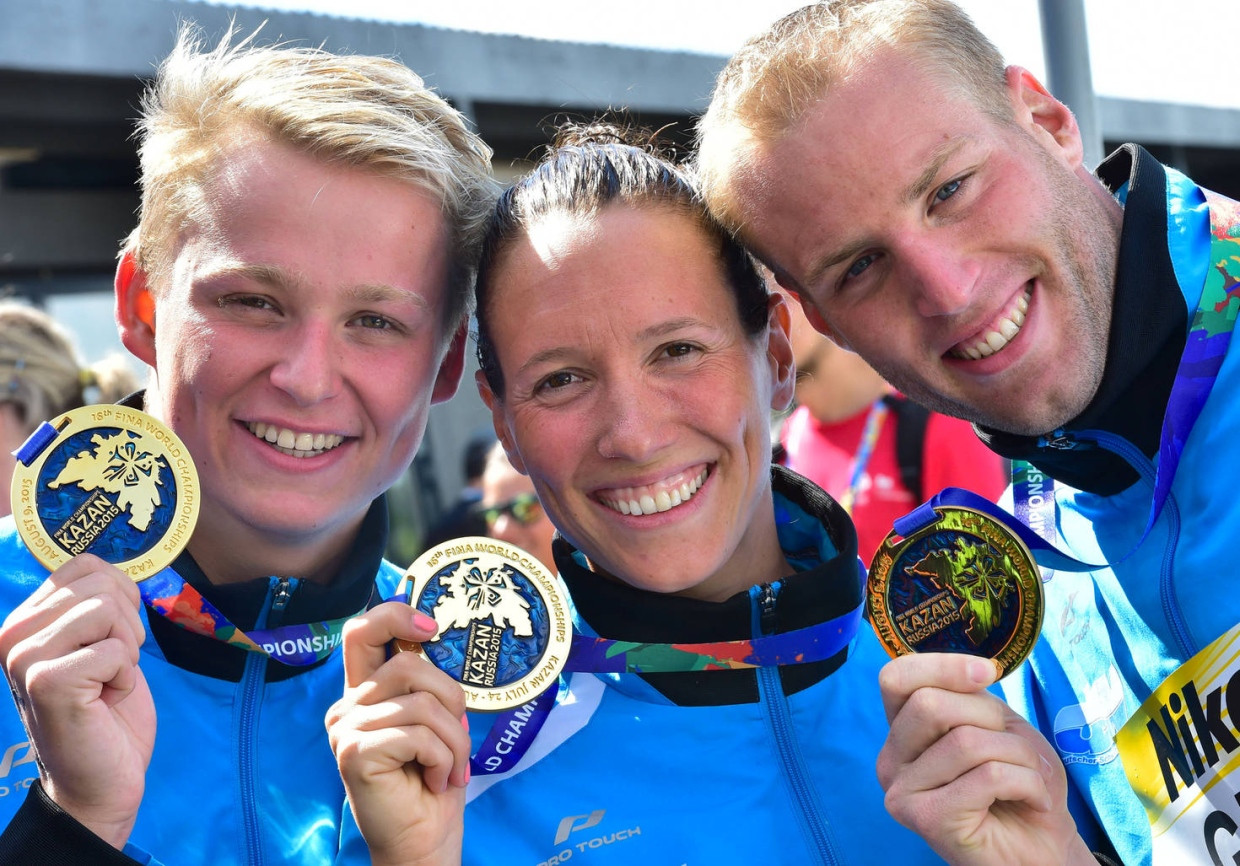 Goldenes Trio: Rob Muffels (l.), Isabelle Haerle und Christian Reichert sind Weltmeister