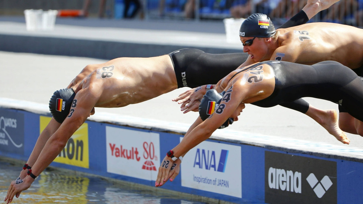 Gut geschwommen: Christian Reichart, Isabelle Franziska Harle und Rob Muffels holen Gold