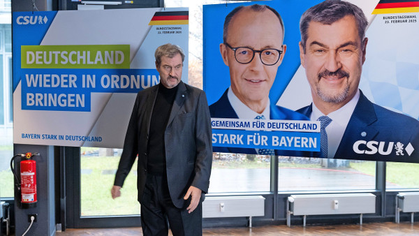 „Gemeinsam für Deutschland“: Markus Söder vor einem Wahlplakat, das auch Kanzlerkandidat Friedrich Merz zeigt