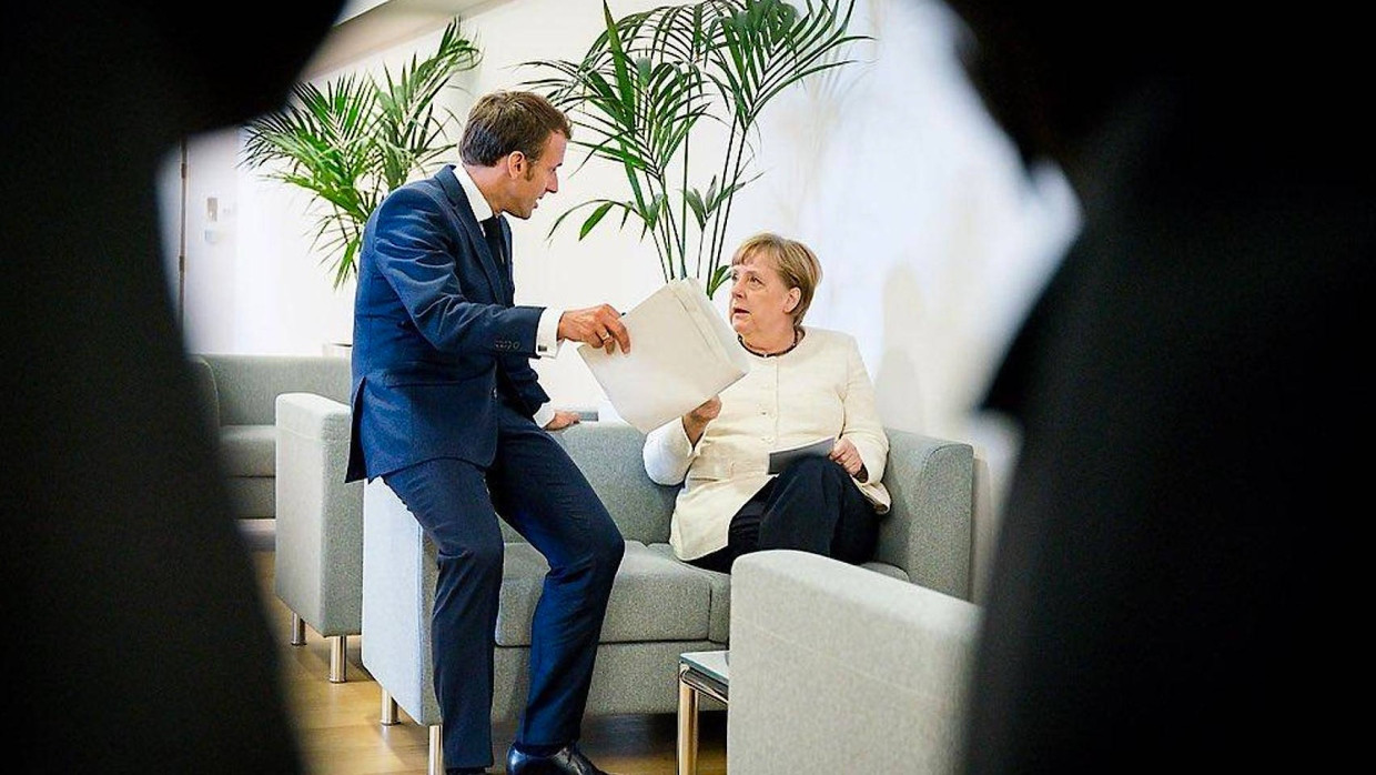 Hat der französische Präsident die deutsche Kanzlerin zu ihrem Glück gezwungen? Angela Merkel und Emmanuel Macron in Brüssel