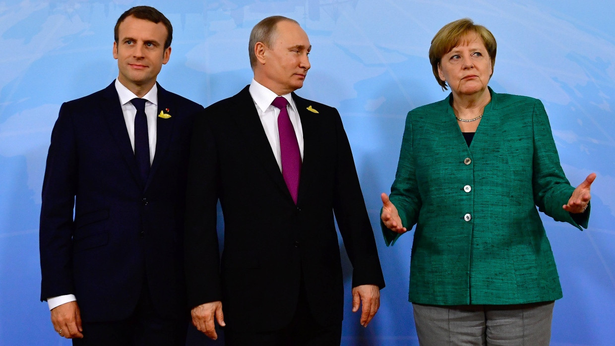 Wollen zu Syrien-Gesprächen nach Istanbul kommen: Macron, Putin und Merke, hier beim G-20-Gipfel in Hamburg