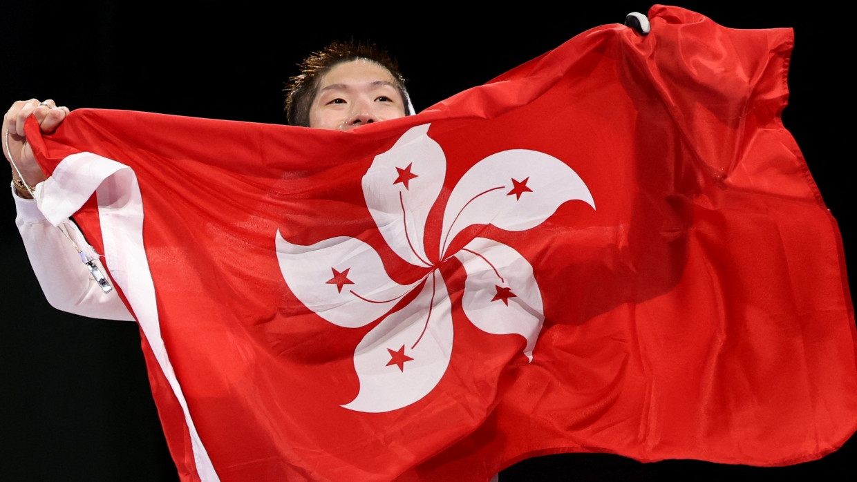 Unter dem Bauhinien-Banner: In Paris starten die Athleten unter der weiß-roten Flagge Hongkongs – vielleicht zum letzten Mal.