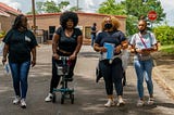 The four women mentioned in this article going on a door-knocking vaccine drive.