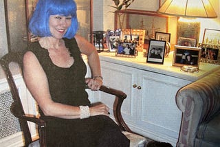 Me in my blue wig in my apartment