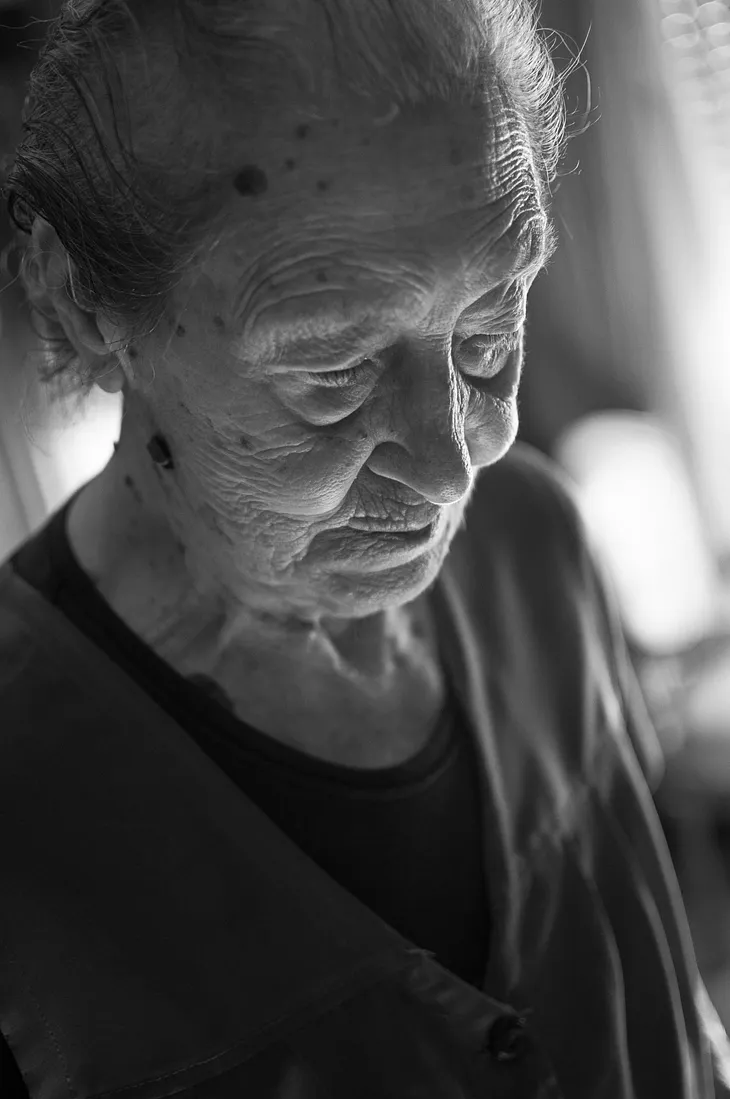 black and white face of an old woman