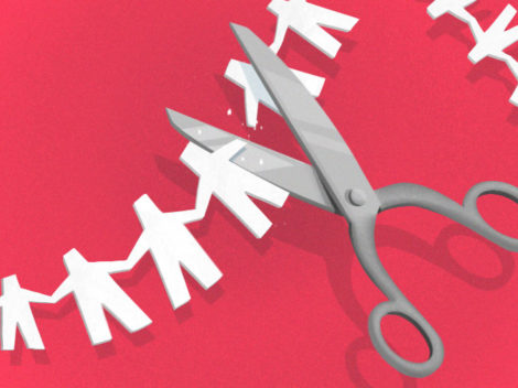 Tech layoffs: Illustration of scissors cutting a paper people chain.